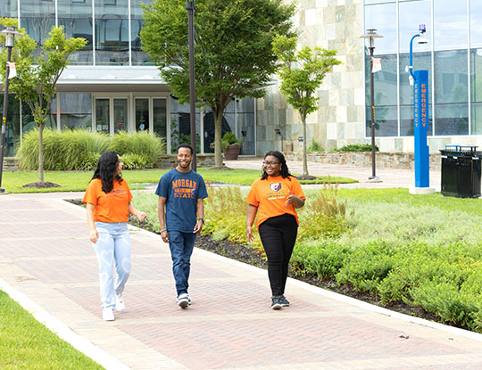 students walking on a sidewalk