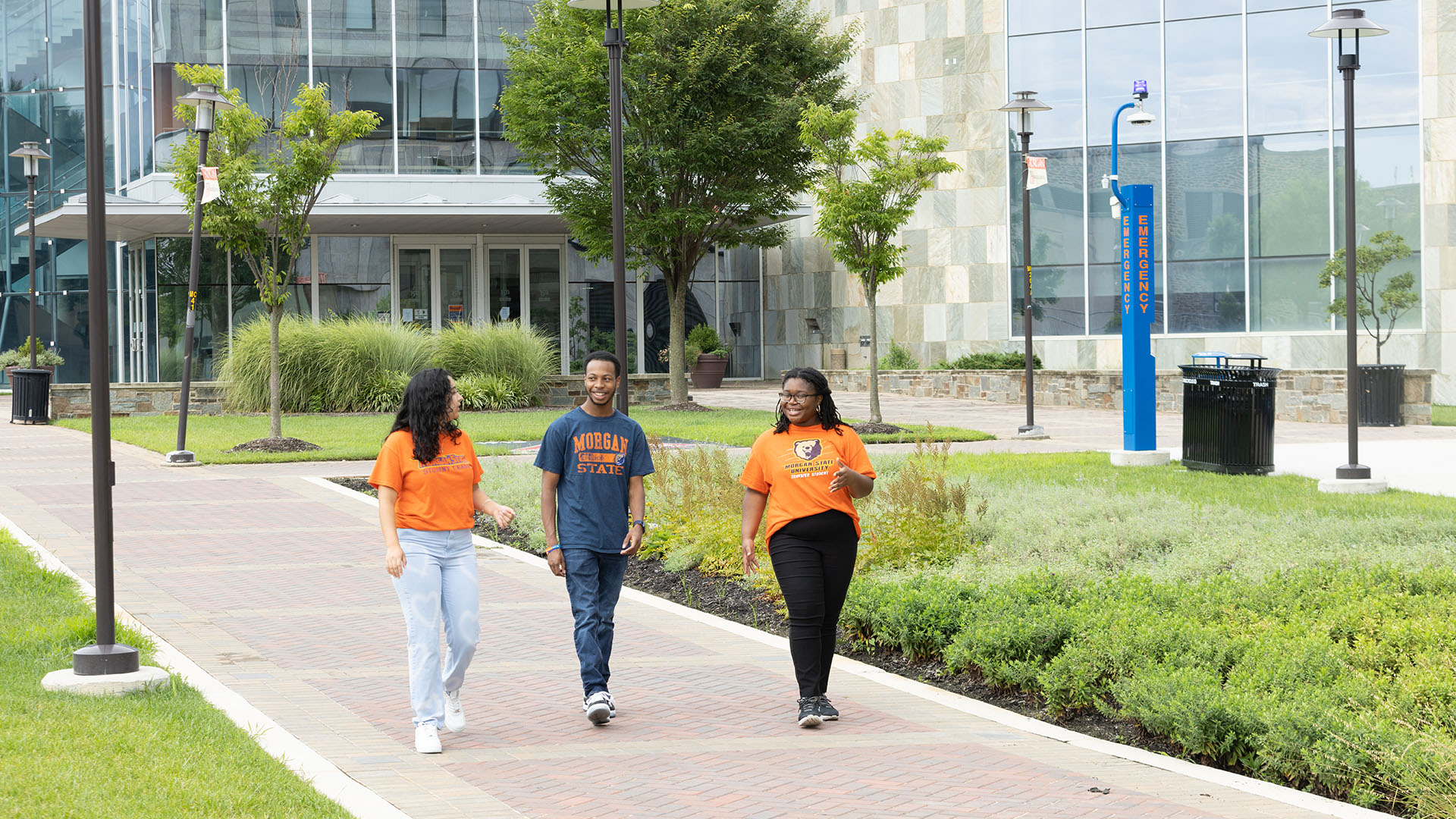 students walking on sidewalk