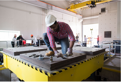 engineer on top of a platform