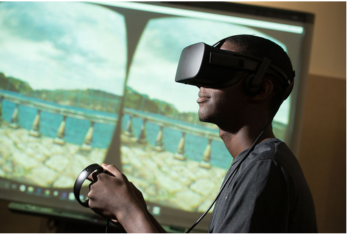 student wearing virtual reality goggles