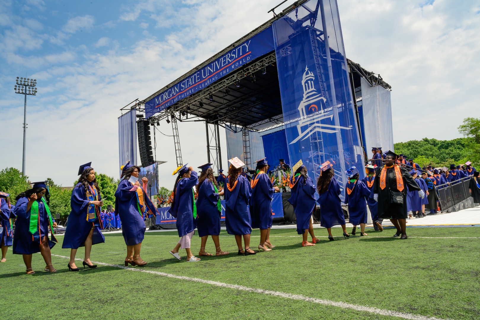 graduates lining up to go on the stage
