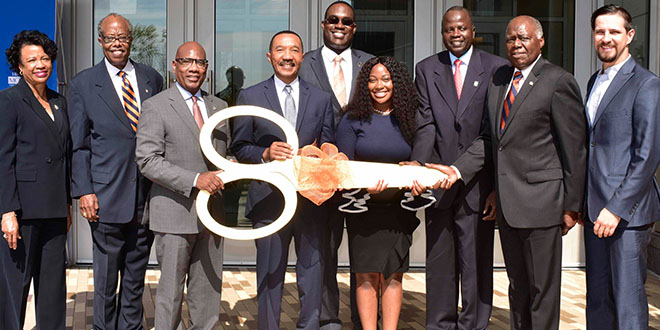 photo of Jenkins Hall ribbon cutting participants|interior photo of Jenkins Hall