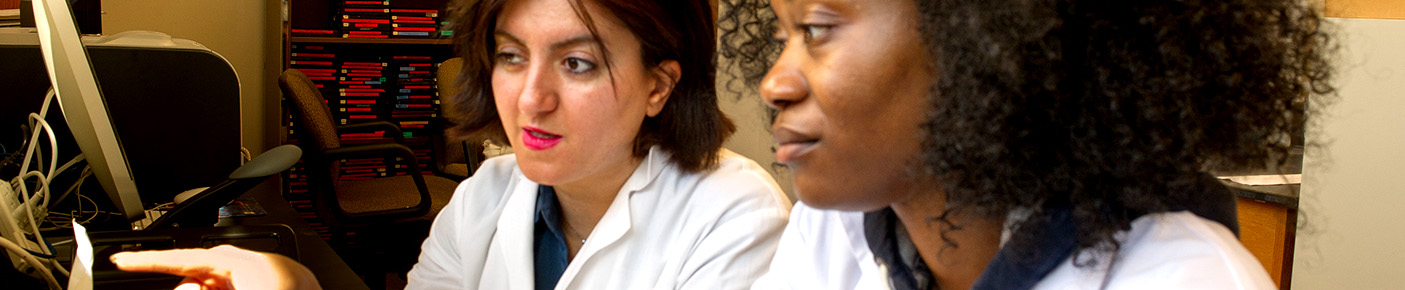 teacher helping student