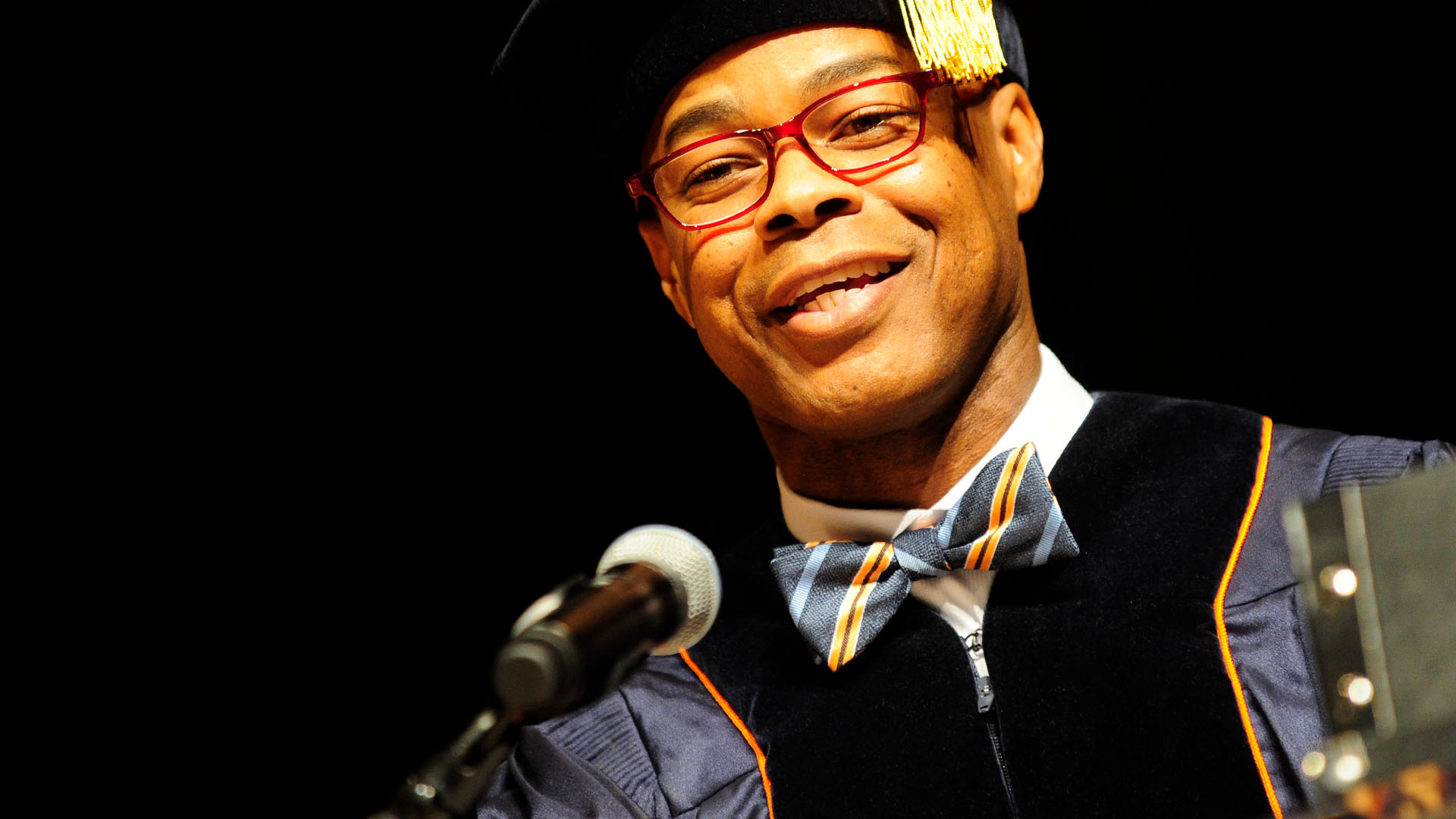 graduate student at microphone